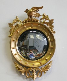 Appraisal: A Regency gilt framed convex mirror damage