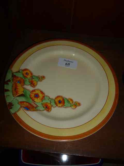 Appraisal: CLARICE CLIFF BIZARRE WARE SUNSHINE PATTERN PLATE in diameter