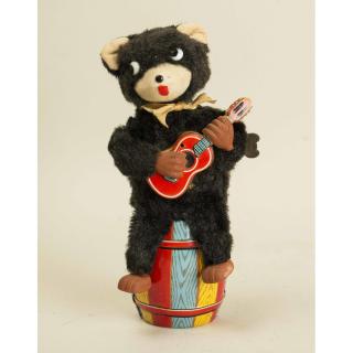 Appraisal: Jolly Guitarist Bear on Barrel Wind Up Toy Jolly Guitarist