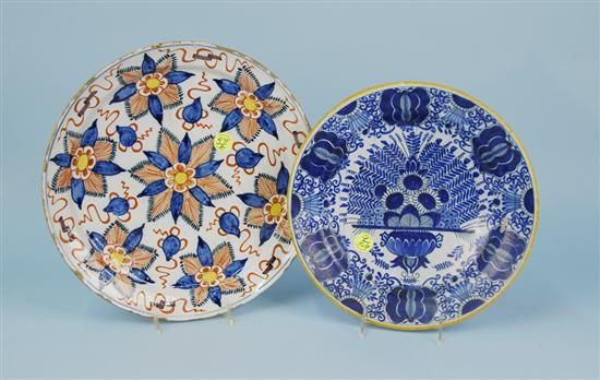 Appraisal: DUTCH DELFT POLYCHROME DECORATED CHARGER and a TIN GLAZED EARTHENWARE