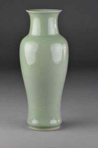 Appraisal: Chinese Qing Celadon Incised Porcelain VaseIncised thought depicting lotus blossom