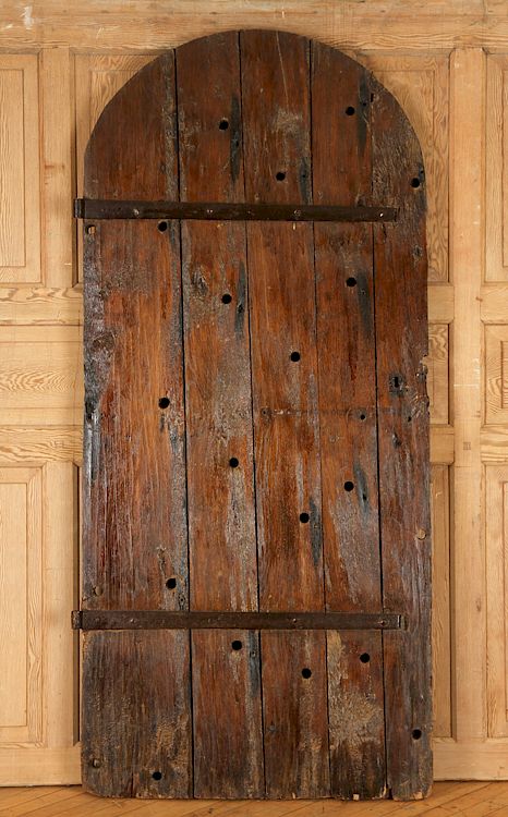 Appraisal: RUSTIC ARCHED TOP DOOR HAVING IRON HINGES A rustic arched