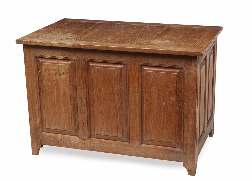 Appraisal: OAK PANEL CHEST the hinged top over a panelled front