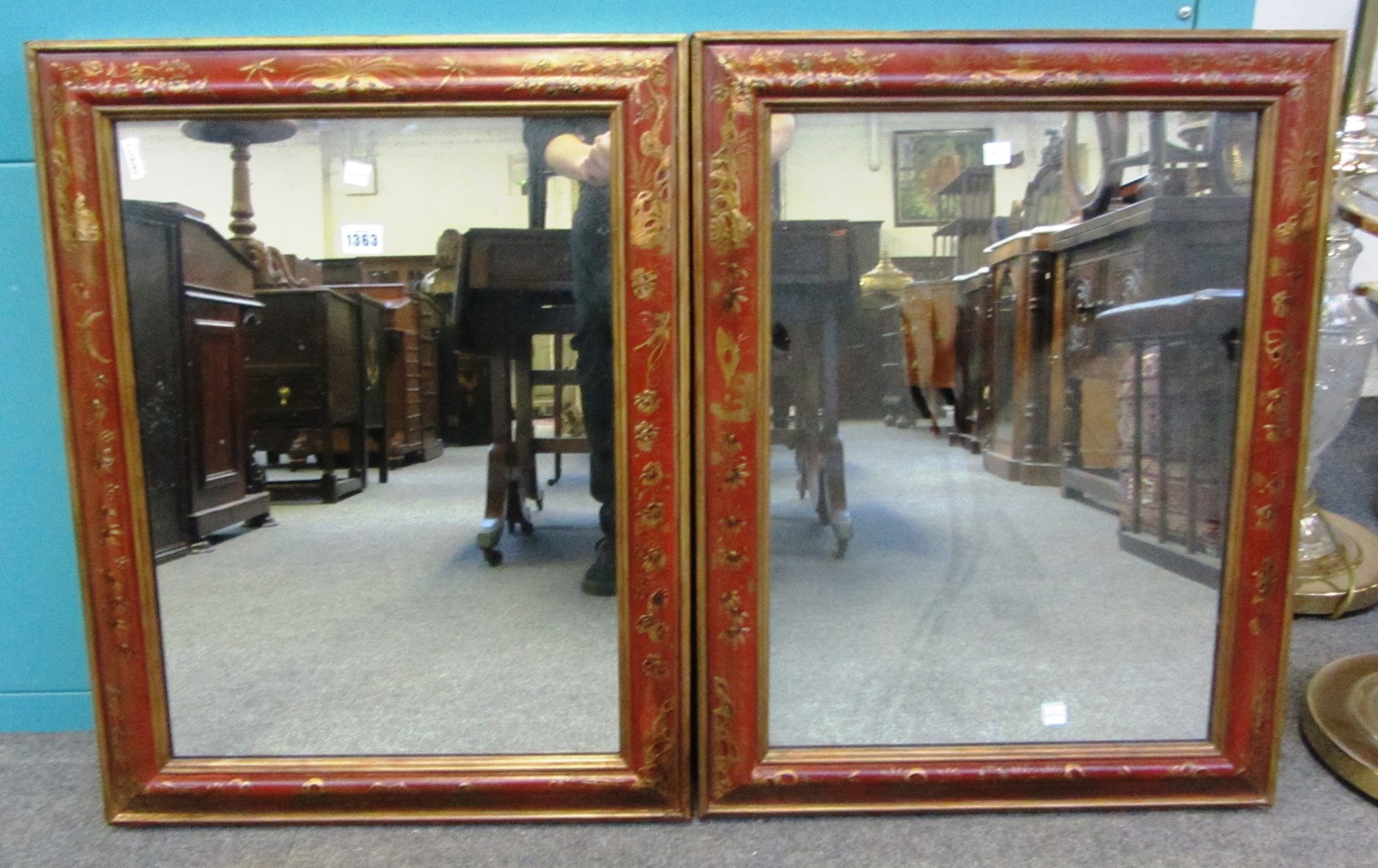 Appraisal: A pair of th century red lacquered rectangular wall mirrors