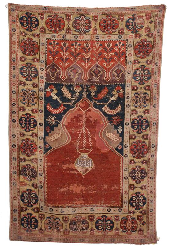 Appraisal: LADIK TYPE PRAYER RUG Turkey th th century feet inches