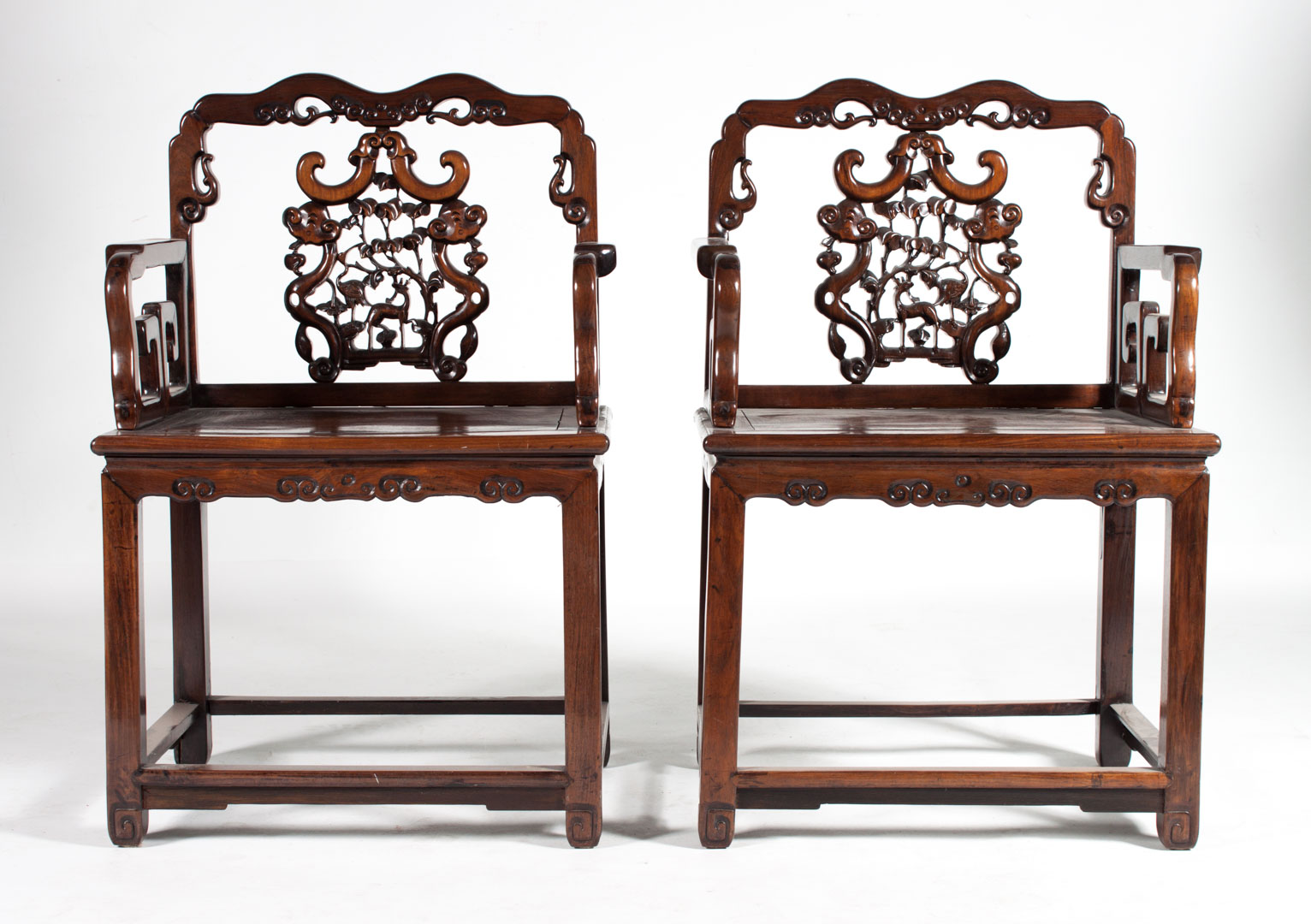 Appraisal: Pair of Chinese carved rosewood armchairs second quarter- th century