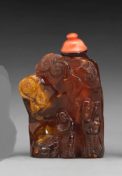 Appraisal: A carved amber snuff bottle th Century The large bottle