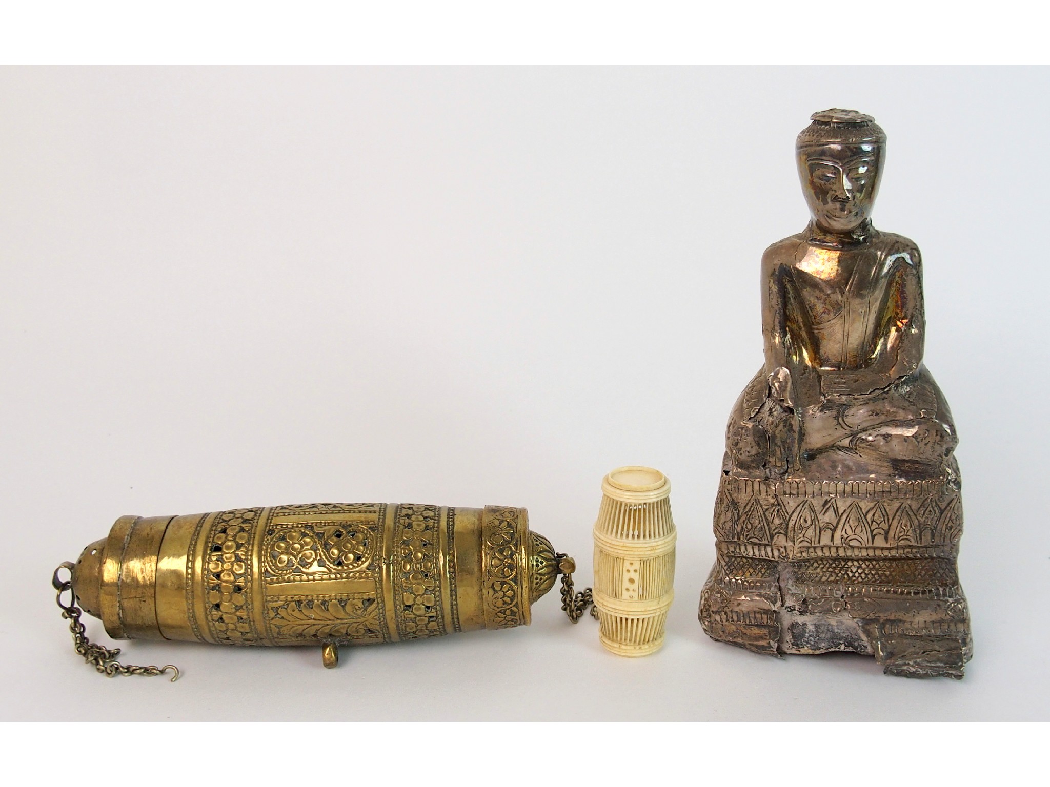 Appraisal: A silver mounted stone carved model of Buddhaseated on a