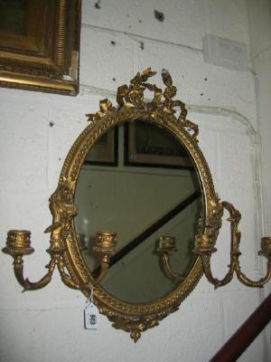 Appraisal: A VICTORIAN GILT GESSO GIRONDOLE the oval plate within a