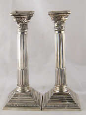 Appraisal: A pair of silver Corinthian column candlesticks Birmingham ht cm