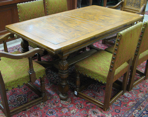 Appraisal: AN OAK DINING TABLE AND CHAIR SET Elizabethan Revival style