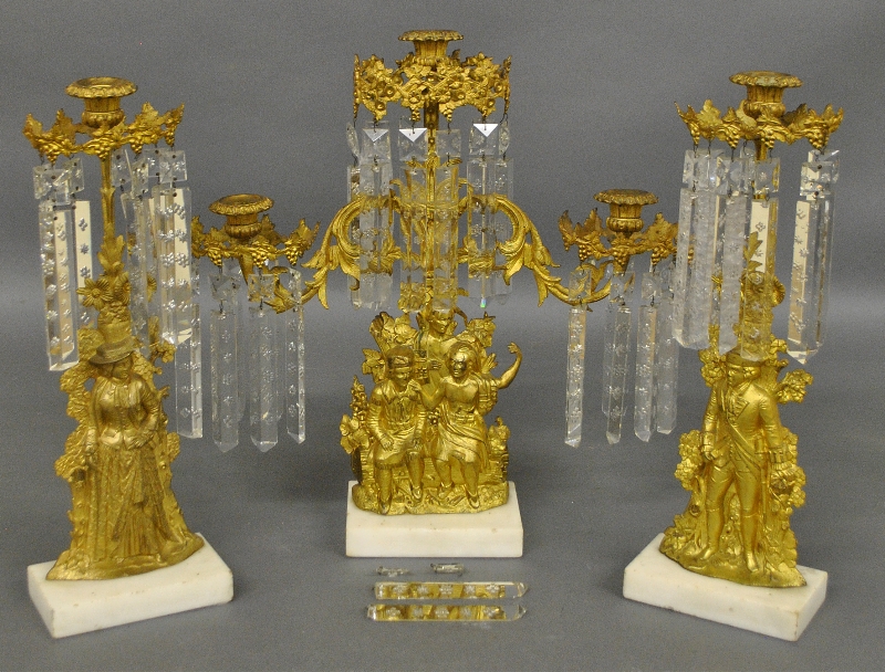 Appraisal: - Three-piece gilt metal girandole set th c Centerpiece h