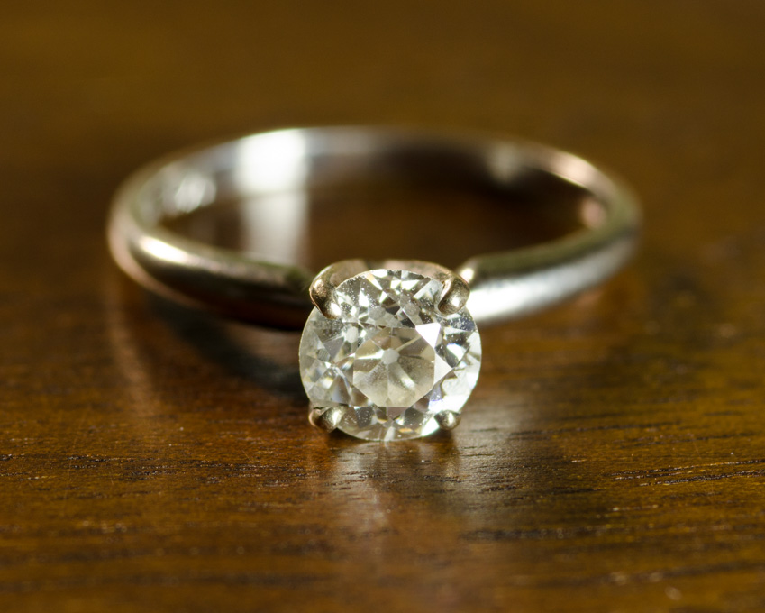 Appraisal: DIAMOND AND FOURTEEN KARAT GOLD SOLITAIRE RING The white gold