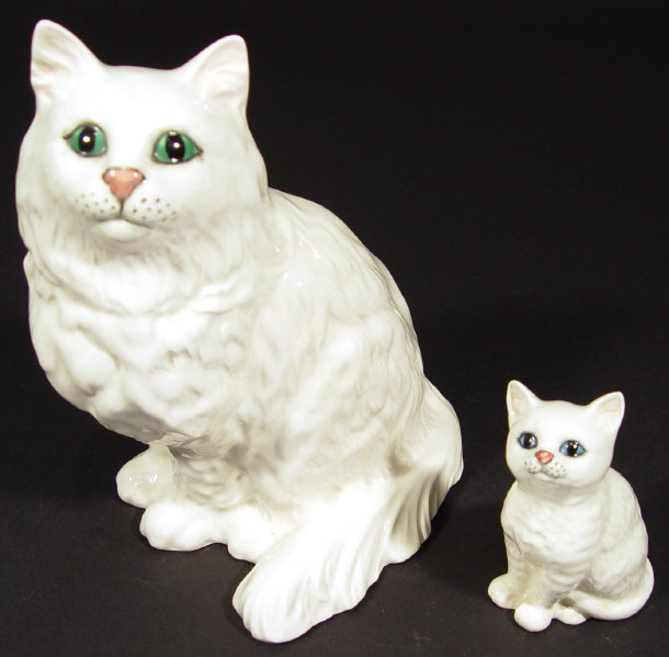 Appraisal: Two Beswick china cats hand painted in white printed factory