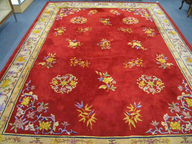 Appraisal: Chinese Handmade Wool Room Size Rug scupltured floral design on