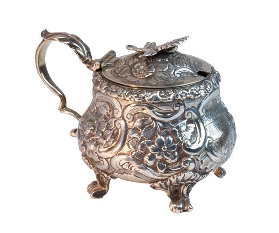 Appraisal: A George III silver mustard pot of bombe form embossed