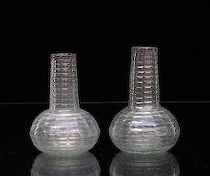 Appraisal: A Pair of Cut Pontil Bottles Matching clear glass bud