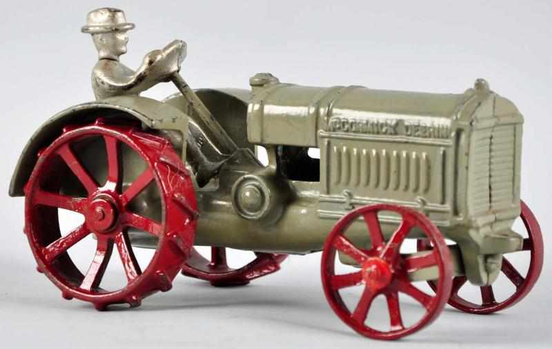 Appraisal: Cast Iron Arcade McCormick-Deering Tractor Toy Description American Original nickel