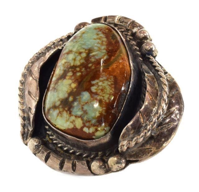 Appraisal: Native American silver content unknown ring with turquoise cabochon silver