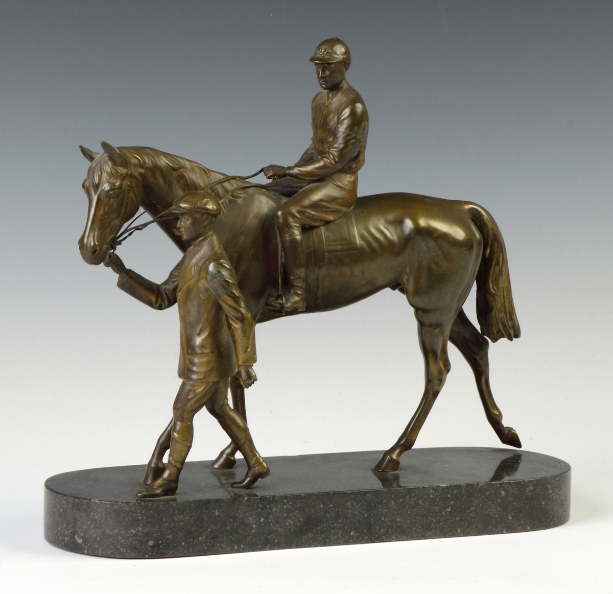 Appraisal: Patinaed Bronze Sculpture w Horse Jockey Trainer C Marble base