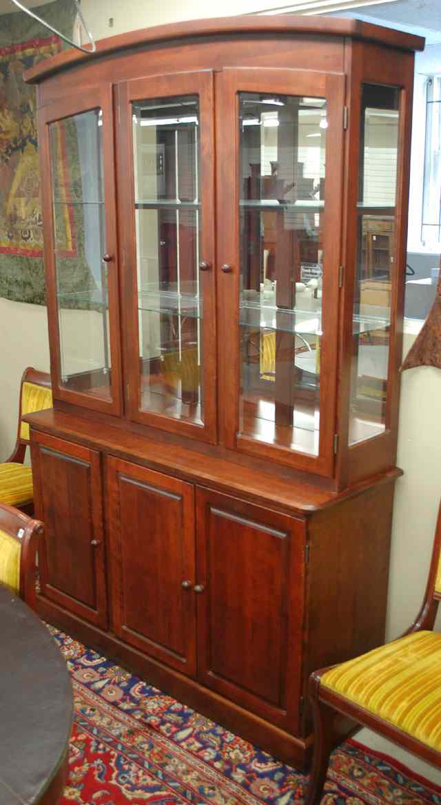 Appraisal: CONTEMPORARY CHINA HUTCH IN TWO SECTIONS Meubles Canadel Furniture Co