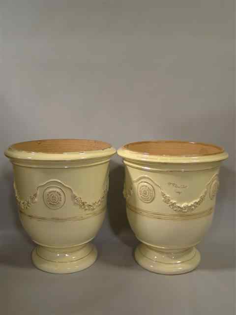 Appraisal: PAIR OF LARGE FRENCH ANDUZE YELLOW GLAZED TERRA COTTA URNS