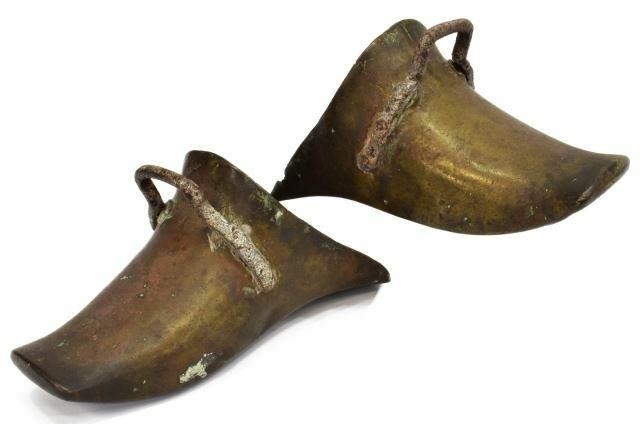 Appraisal: pair Spanish Colonial Conquistador style brass riding stirrups approx h