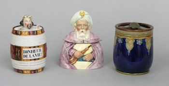 Appraisal: A Figural Porcelain Tobacco Jar Of A Man In A