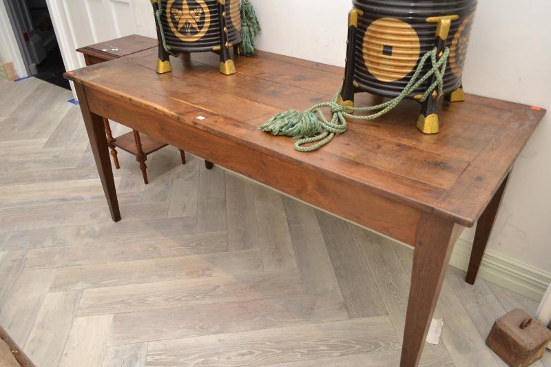 Appraisal: A RUSTIC OAK FARMHOUSE TABLE A RUSTIC OAK FARMHOUSE TABLE