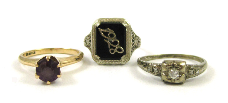 Appraisal: THREE FOURTEEN KARAT GOLD RINGS including a size - white