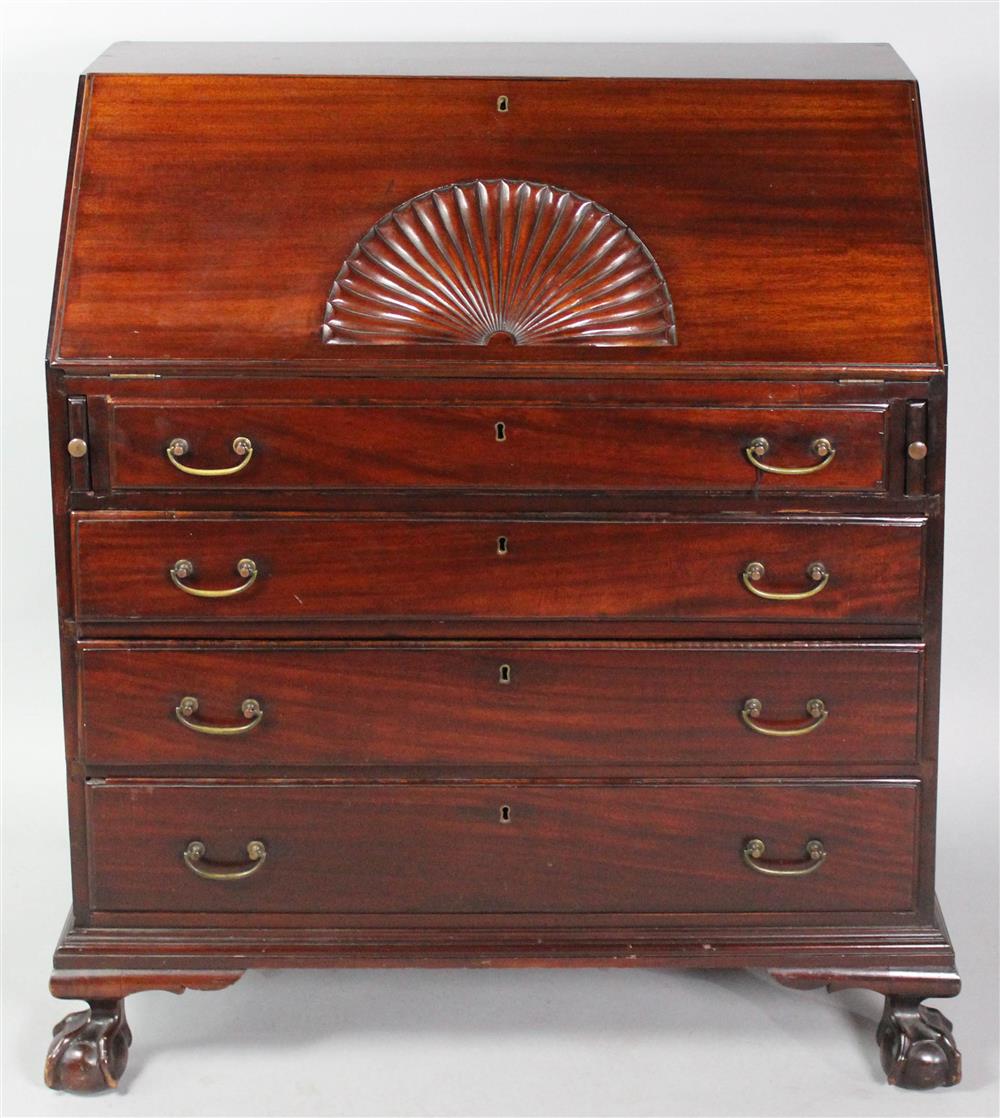 Appraisal: CHIPPENDALE STYLE MAHOGANY SLANT FRONT BUREAU with stylized shell carving