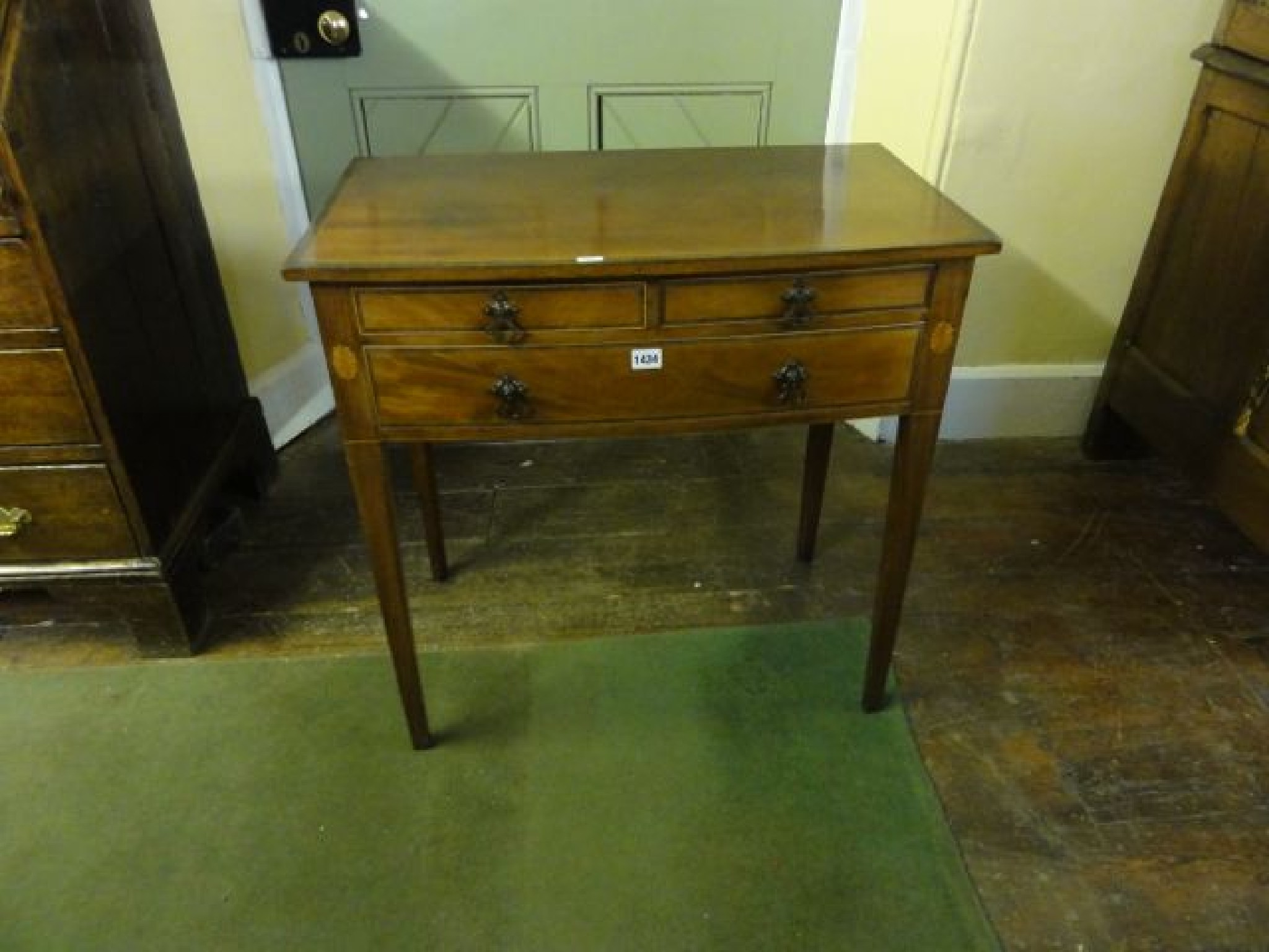 Appraisal: A small th century mahogany side table with chequered string