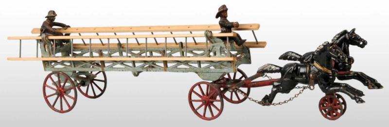 Appraisal: Cast Iron Wilkins Horse-Drawn Ladder Wagon Description Blue ladder wagon