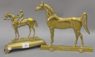 Appraisal: Two brass horse door stops one marked Copyright Rife Loth