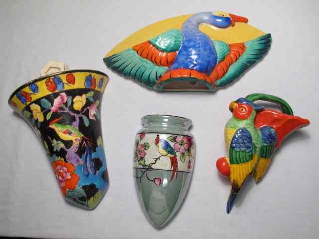 Appraisal: Group lot of assorted bird wall pockets Hand painted with