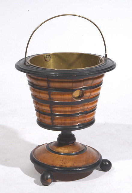 Appraisal: A DUTCH EBONISED AND WALNUT WINE COOLER with metal lining