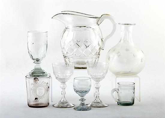 Appraisal: Collection of early blown glass mug stems and pitcher th