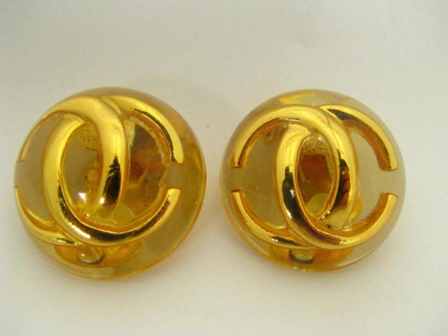 Appraisal: Chanel clear ''dome'' '' diameter logo clip back earrings