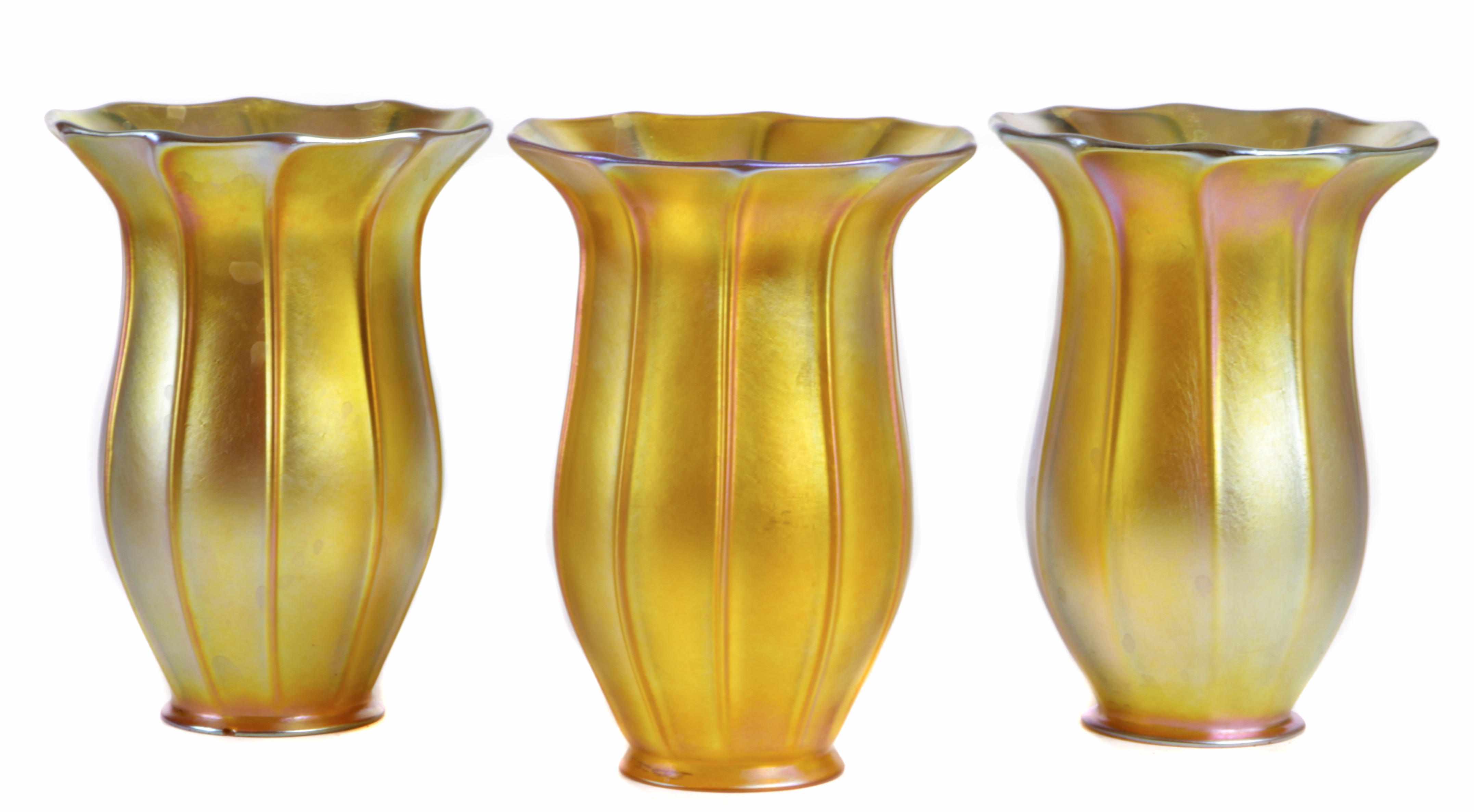 Appraisal: A set of three Quezal glass lamp shades early th