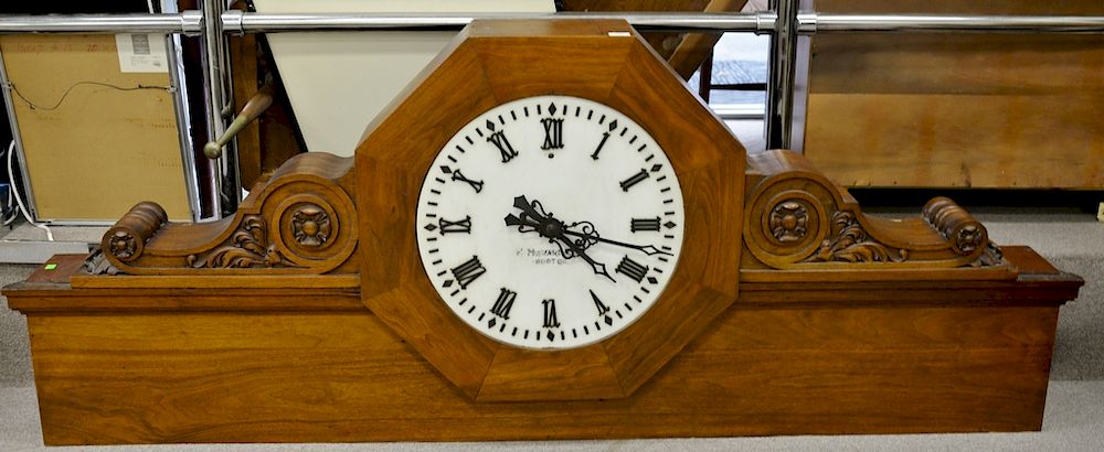 Appraisal: Architectural mahogany with electric clock having marble face marked E