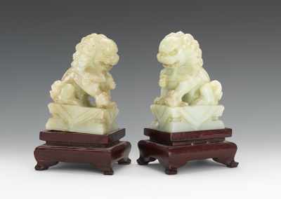 Appraisal: A Pair of Jade Foo Dogs Both of the Food