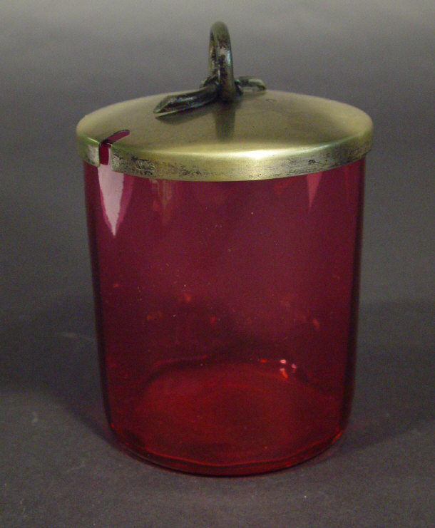 Appraisal: Cylindrical cranberry glass preserve pot with silver plated lid cm