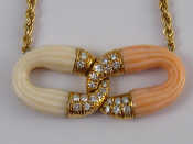 Appraisal: A yellow metal tests carat gold pink and white coral