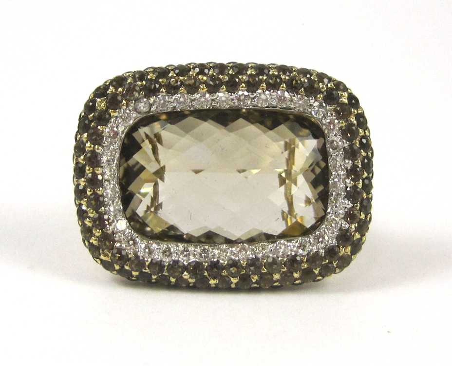 Appraisal: SMOKY QUARTZ DIAMOND AND EIGHTEEN KARAT GOLD RING with round-cut