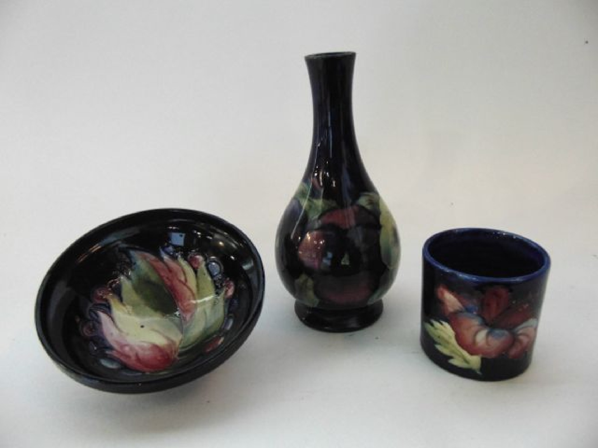 Appraisal: A Moorcroft blue ground vase of bottle shaped form with