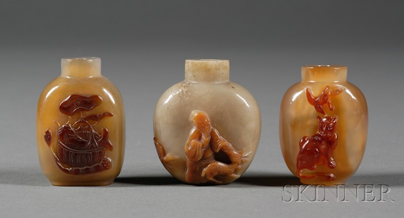 Appraisal: Three Shadow Agate Snuff Bottles carving of Shao Lao with