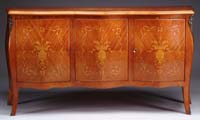 Appraisal: CONTINENTAL THREE DOOR INLAID SIDEBOARD Shape front sideboard having three