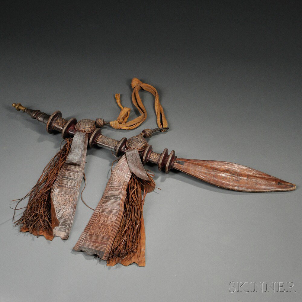 Appraisal: Mandingo Sword and Highly Ornate Leather Scabbard lg in Estimate