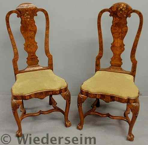 Appraisal: Pair of Dutch Chippendale style marquetry inlaid fruitwood side chairs