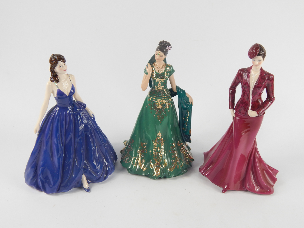 Appraisal: Three Royal Worcester porcelain figures modelled as Crystal Ball limited